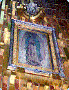 Tilma hanging above and behind the main altar at the Basilica in Mexico City