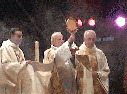 The Bishop blesses the multitude gathered for Benediction
