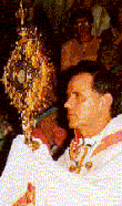 Father Jozo brings in the Blessed Sacrament during a recent Marian conference - photo from www.Medjugorje.org