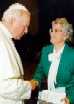 The Holy Father receives Seton materials from Dr. Clark during a private audience